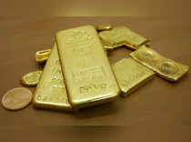FILE PHOTO: Gold bars are displayed at a gold jewelry shop in Chandigarh