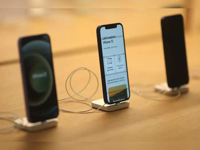 IPhone 12 phones are seen at the new Apple Store on Broadway in downtown Los Angeles