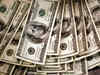 Dollar pinned as Powell plods toward tapering
