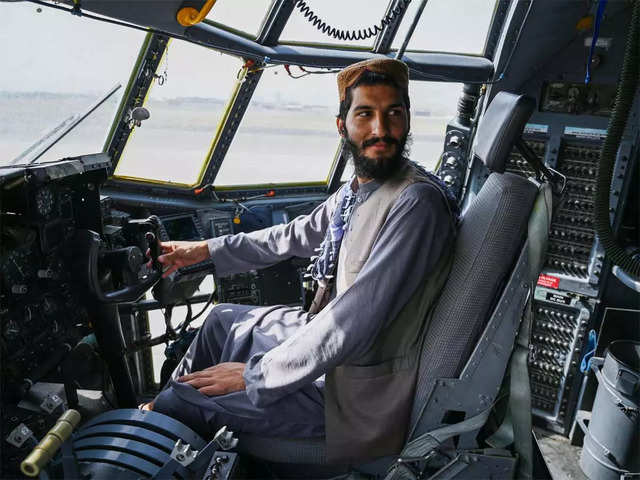Taliban fighter inside the cockpit