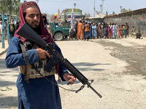 A member of the Taliban forces stands guard during an organised media tour to the Pakistan-Afghanistan crossing border, in Torkham,