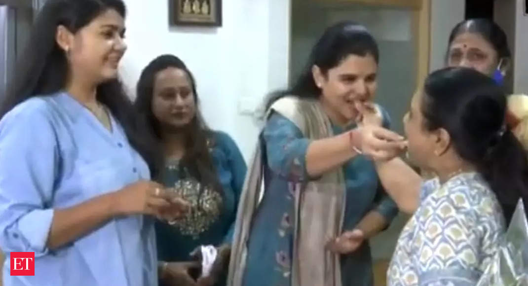 Watch: Gujarat CM-elect Bhupendra Patel's family exchange sweets - The ...
