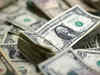 Dollar touches three-week high, lifted by recent data, Fed taper view