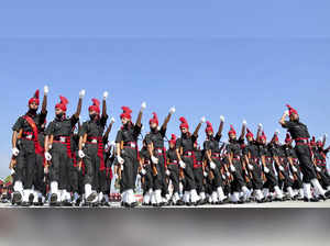 Srinagar: New Army recruits take part in their passing out parade at Army's JAKL...