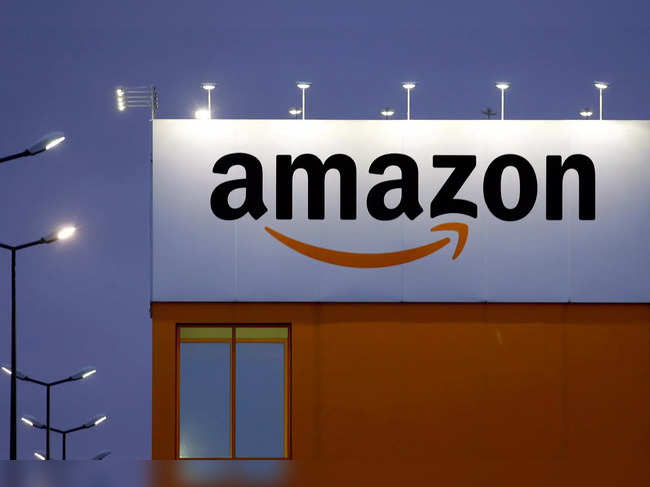 FILE PHOTO: The logo of Amazon is seen at the company logistics center in Lauwin-Planque, northern France