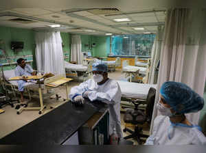 FILE PHOTO: Healthcare workers are seen inside a ward for coronavirus disease (COVID-19) patients at Sir Ganga Ram Hospital in New Delhi