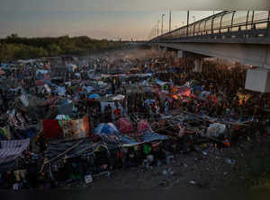Migrants shelter near Del Rio International Bridge in Del Rio, Texas