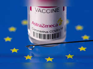 FILE PHOTO: Vial labelled "AstraZeneca coronavirus disease (COVID-19) vaccine" placed on displayed EU flag is seen in this illustration picture