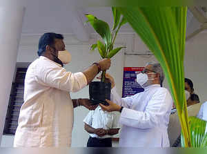 Kerala, Sep 16 (ANI): Pala Bishop Mar Joseph Kallarangatt presents a sapling to ...
