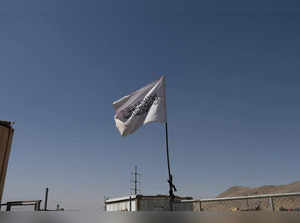Flag of the Islamic Emirate of Afghanistan (Taliban) is raised at the military airfield in Kabul