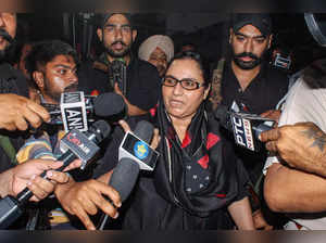 Patiala: Punjab Cabinet Minister Razia Sultana talks to the media as she arrives...
