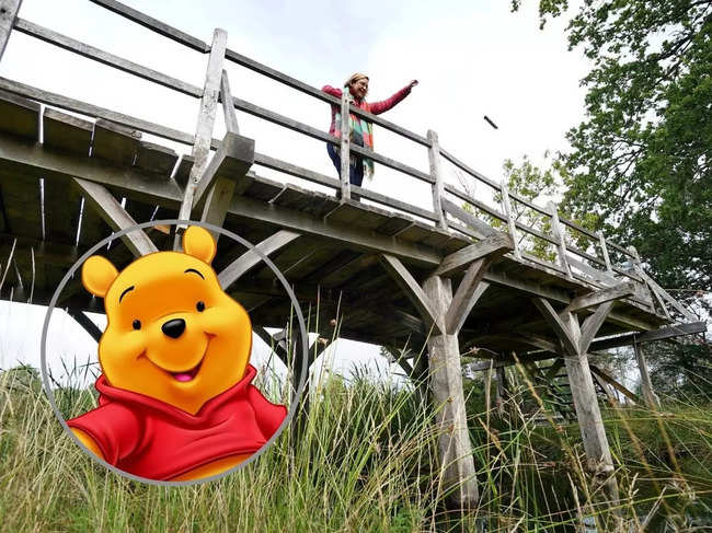 The bridge, originally called Posingford Bridge, was built around 1907 and officially renamed Poohsticks Bridge in 1997 by the late author's son, whose toy animals were the basis of the Pooh series.