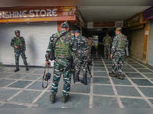 Srinagar: Security personnel preparing for a search operation after a civilian w...