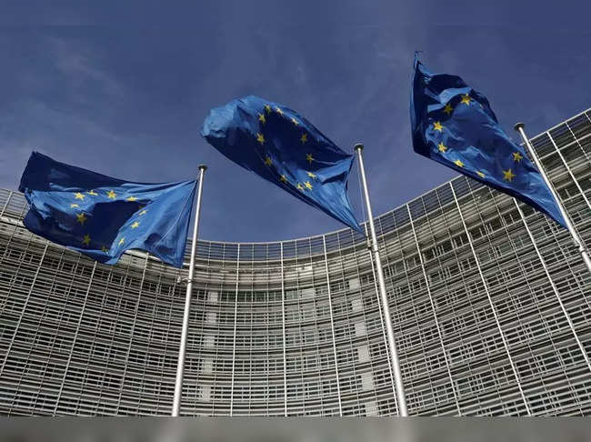 FILE PHOTO: European Union flags flutter outside the European Commission headquarters in Brussels