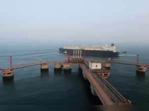 A liquified natural gas (LNG) tanker leaves the dock