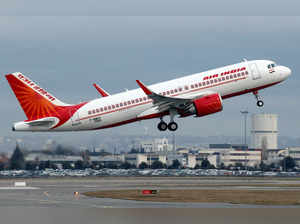 FILE PHOTO: An Air India Airbus A320neo plane takes off in Colomiers near Toulouse