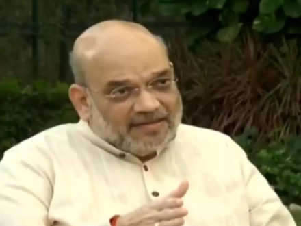 Amit Shah hails PM Modi style of governance, says 'aim not to remain in  power, but put India first' - The Economic Times Video | ET Now