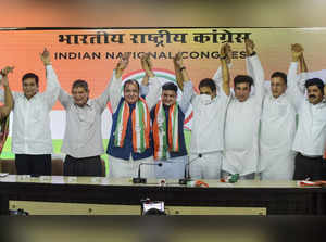 New Delhi: Uttarakhand BJP leader Yashpal Arya with his son MLA Sanjeev Arya joi...