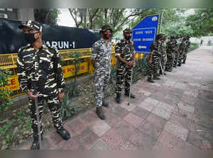 New Delhi: Delhi police stand guard during a protest against Thursday's violence...