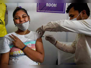 New Delhi: A health worker administers Covid-19 vaccine dose to a beneficiary at...
