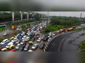 New Delhi: Traffic jam at Dhaula Kuan following heavy rains in New Delhi. (PTI P...