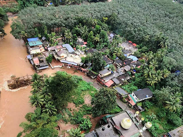 Kerala floods: Photos of rain fury and rescue operations - Heavy rains and landslide in Kerala | The Economic Times