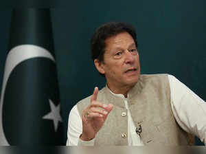FILE PHOTO: Pakistan's PM Imran Khan speaks during an interview with Reuters in Islamabad,