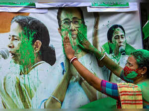 Balurghat: Trinamool Congress (TMC) supporters celebrate after party Supremo and...
