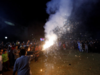 Fireworks, joyous fans on streets as Pakistan celebrates unprecedented win over India in ICC World Cup
