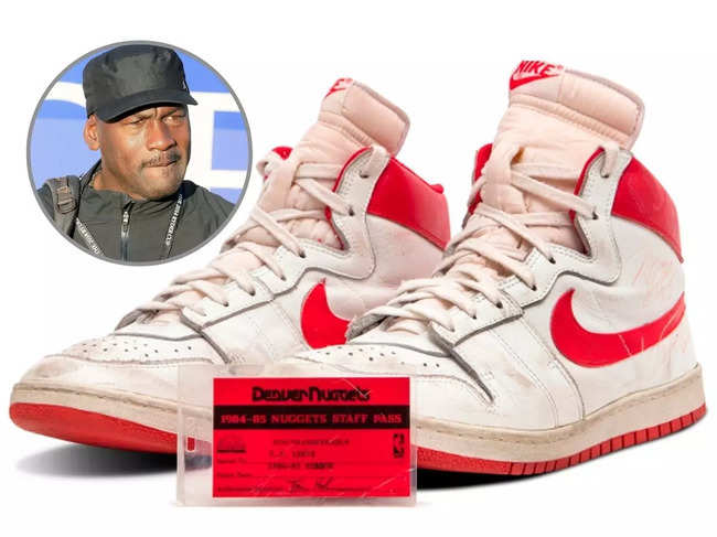 Michael Jordan's autographed size-13 lace-ups were in good overall condition, with signs of court wear and tear,