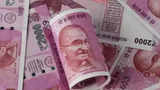 Rupee settles 18 paise lower at 75.08 against US dollar