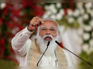 India's PM Modi addresses a gathering before flagging off the "Dandi March", in Ahmedabad