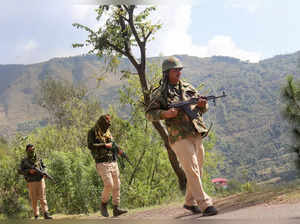 Poonch: Security personnel patrol near the site of encounter between militants a...