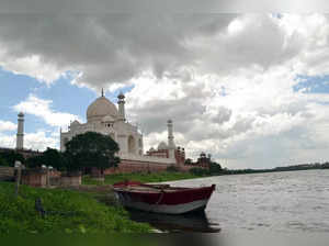 Uttar Pradesh, Sep 15 (ANI): Boat seen anchored on the Yamuna river behind the T...