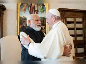Vatican City: India's Prime Minister Narendra Modi, left, and Pope Francis hug o...