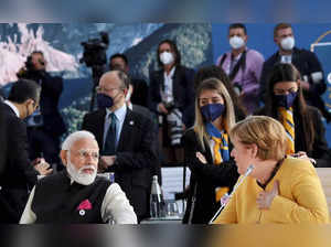 Rome: Prime Minister Narendra Modi with German Chancellor Angela Merkel at the G...