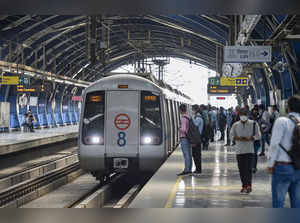 New Delhi: Commuters wait to board a train  at the Lakshmi Nagar Metro Station a...