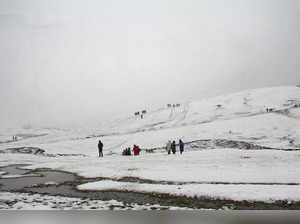 Baramulla: A view of the snow covered Gulmarg during the season's first snowfall...