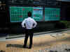 Japan stocks end lower as yen firms; SoftBank Group blunts losses