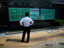 Asian stocks drop as Fed shift reverberates