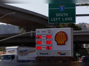 Gas prices grow along with inflation as this sign at a gas station shows in San Diego