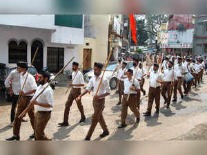Bhopal: Rashtriya Swayamsevak Sangh (RSS) volunteers participate in a march in B...