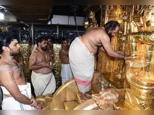 Pathanamthitta: Devotees during the Mandala Pooja festival at Sabarimala temple,...
