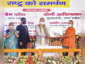Sultanpur_ Prime Minister Narendra Modi being felicitated by Uttar Pradesh Chief....