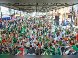 New Delhi: Farmers celebrate after Prime Minister Narendra Modi announced the re...