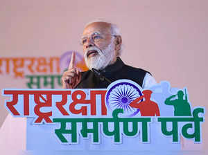 Jhansi: Prime Minister Narendra Modi at the ‘Rashtra Raksha Samparpan Parv’, in ...