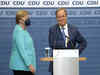 German parties set to announce coalition deal, Merkel bids farewell