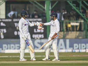 Kanpur: Indian player Shreyas Iyer celebrates with Ravindra Jadeja after scoring...