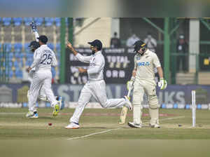 Kanpur: Indian players celebrate the dismissal of New Zealand batsman Tom Latham...