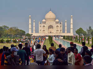 Agra: Tourists visit the historic Taj Mahal in Agra. (PTI Photo)(...